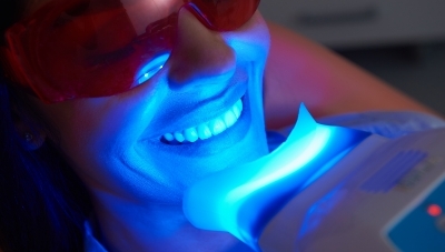 Dental patient getting professional teeth whitening
