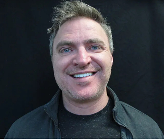 Man smiling after getting his teeth whitened