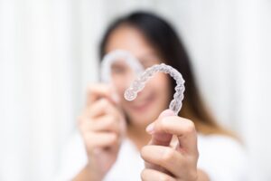 Woman choosing SureSmile after having braces when she was younger