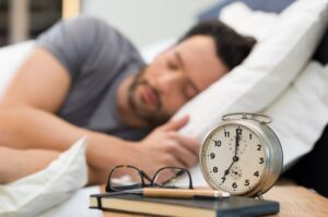 Man sleeping after his wisdom tooth removal